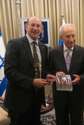 Jeremy Jones AM giving the Cooper book to President of Israel Shimon Peres May 2013