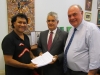 Norman presenting the petition to Ken Wyatt, Member for Hasluck with Warren Entsch, MP, Member for Leichhardt discussing it, Parliament House Canberra 18.11.13